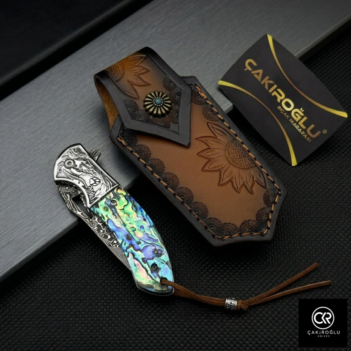 Damascus Steel Folding Knife with Mica Handle