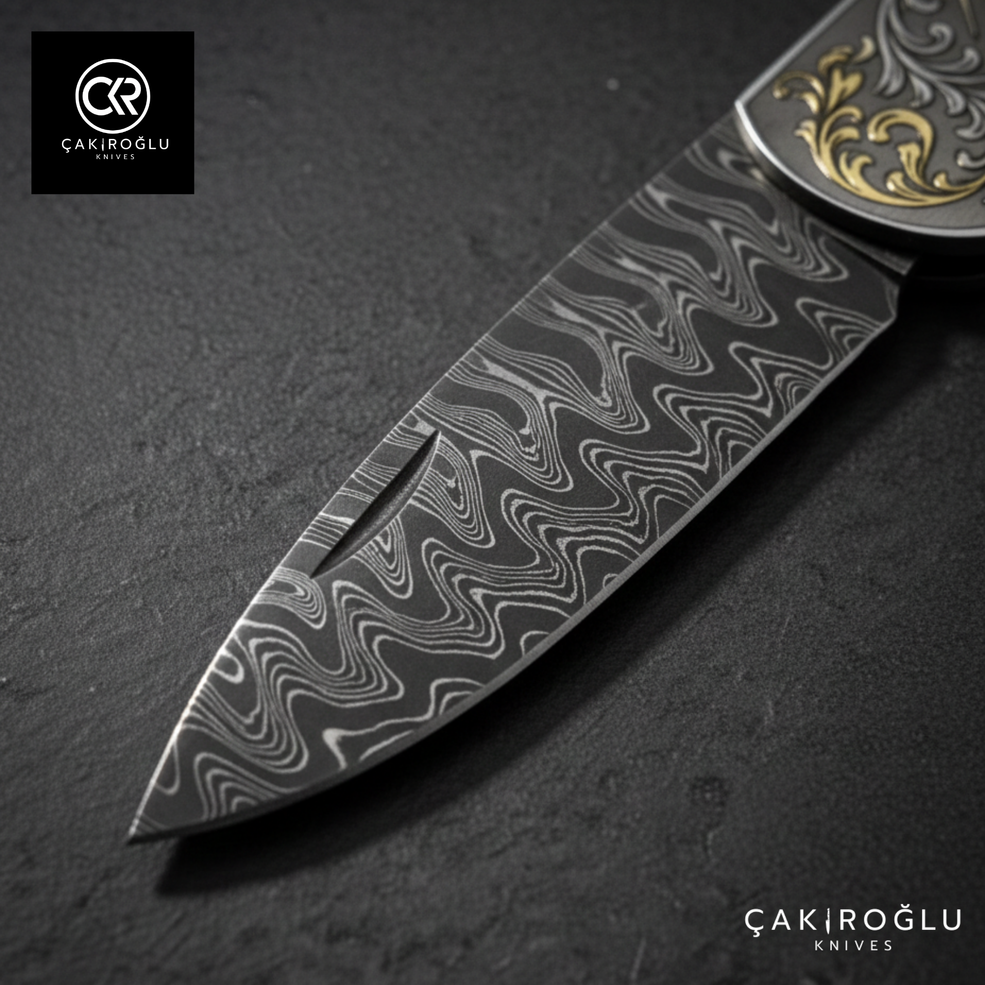 Corvus series Damascus - Limited Edition Collector's Folding Knife with 14K gold engraving details on a stainless steel case