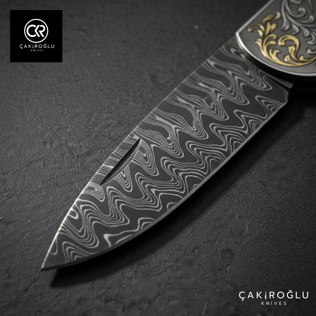 Corvus series Damascus - Limited Edition Collector's Folding Knife with 14K gold engraving details on a stainless steel case