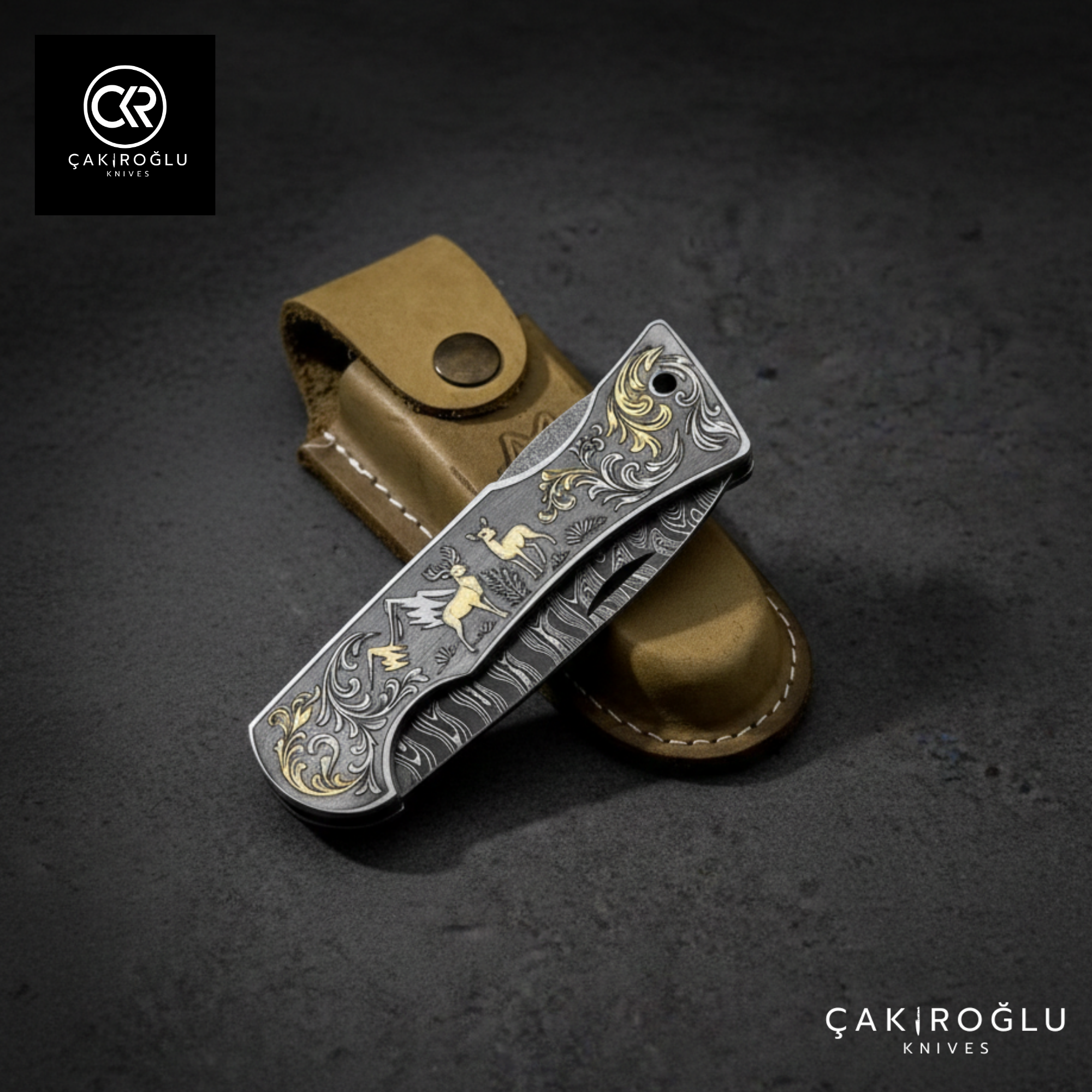 Corvus series Damascus - Limited Edition Collector's Folding Knife with 14K gold engraving details on a stainless steel case