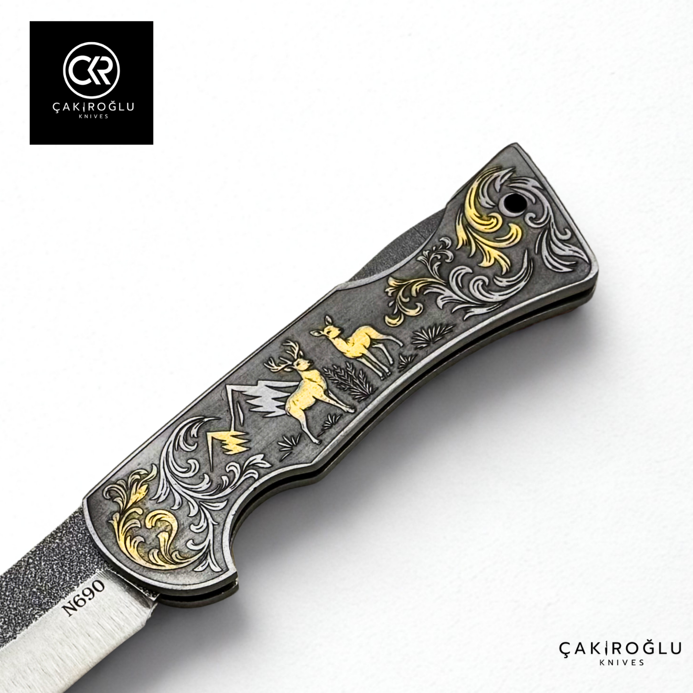 Corvus series N690 - Limited Edition Collector's Folding Knife with 14K gold engraving details on a stainless steel case