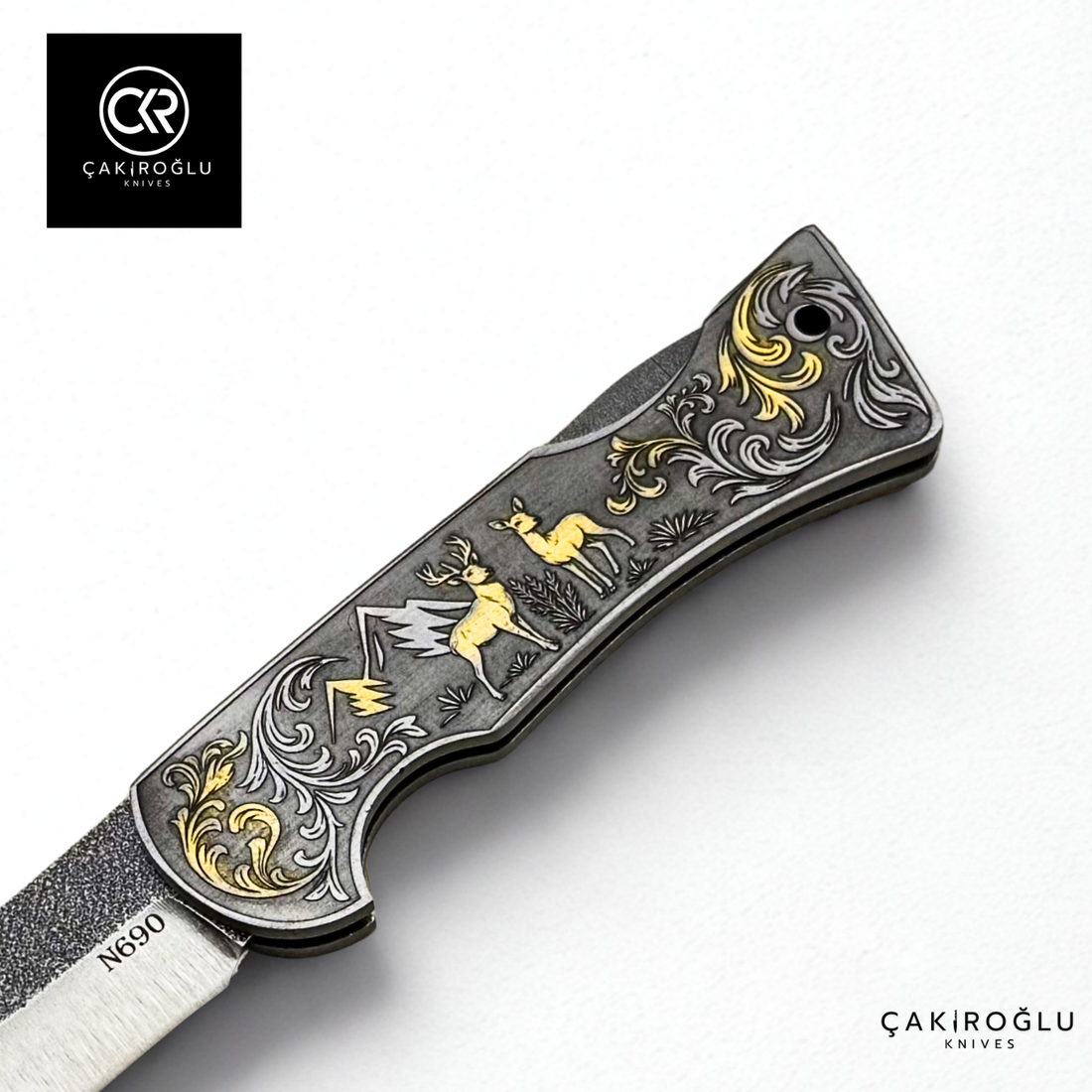 Corvus series N690 - Limited Edition Collector's Folding Knife with 14K gold engraving details on a stainless steel case