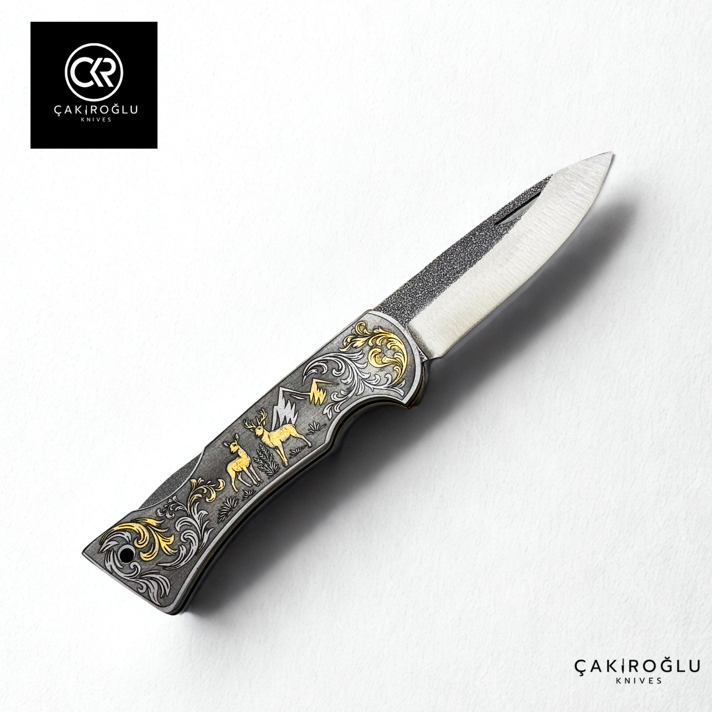 Corvus series N690 - Limited Edition Collector's Folding Knife with 14K gold engraving details on a stainless steel case