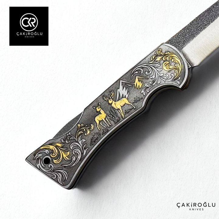 Corvus series N690 - Limited Edition Collector's Folding Knife with 14K gold engraving details on a stainless steel case